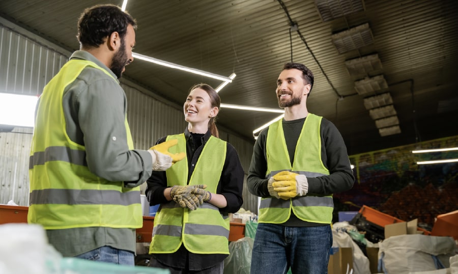 A young family carrying boxes after receiving a delivery highlighting BestHeating's committment to hassle free delivery