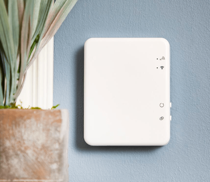 Milano connect WiFi hub on a blue wall
