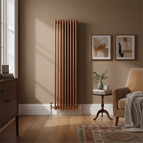 Bronze windsor column radiator against a brown wall in a sitting room