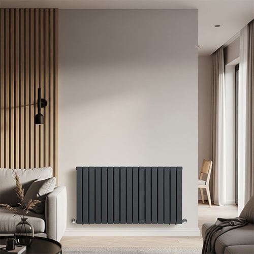 Grey Alpha horizontal designer radiator on a cream kitchen wall
